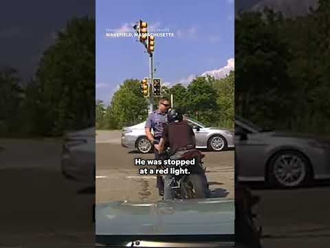 Motorcyclist drives state trooper into oncoming traffic #Shorts